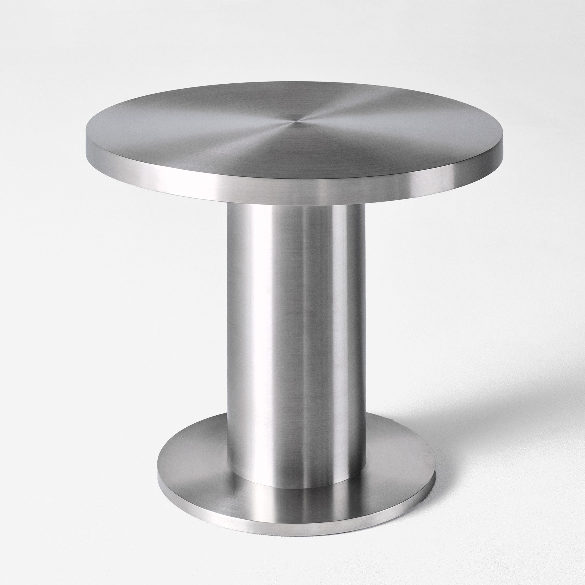 Cufflink Dining Table