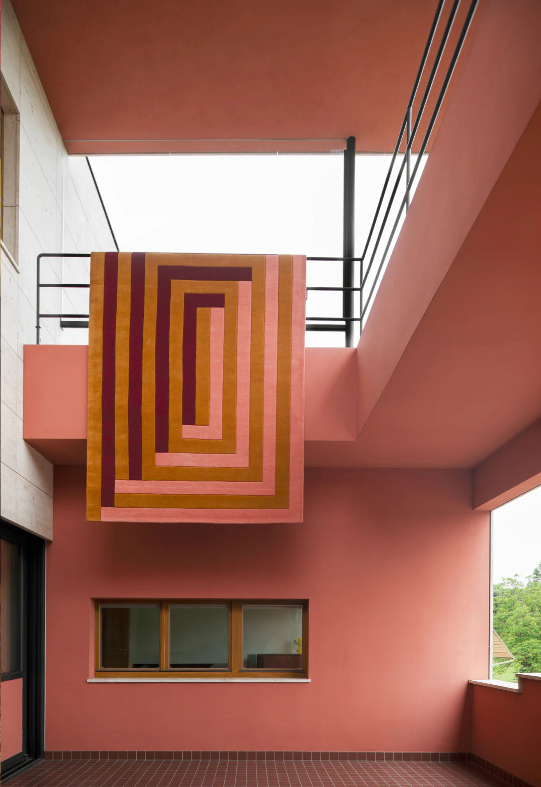 TEKLAN LABYRINTH WOOL RUG CORAL PINK