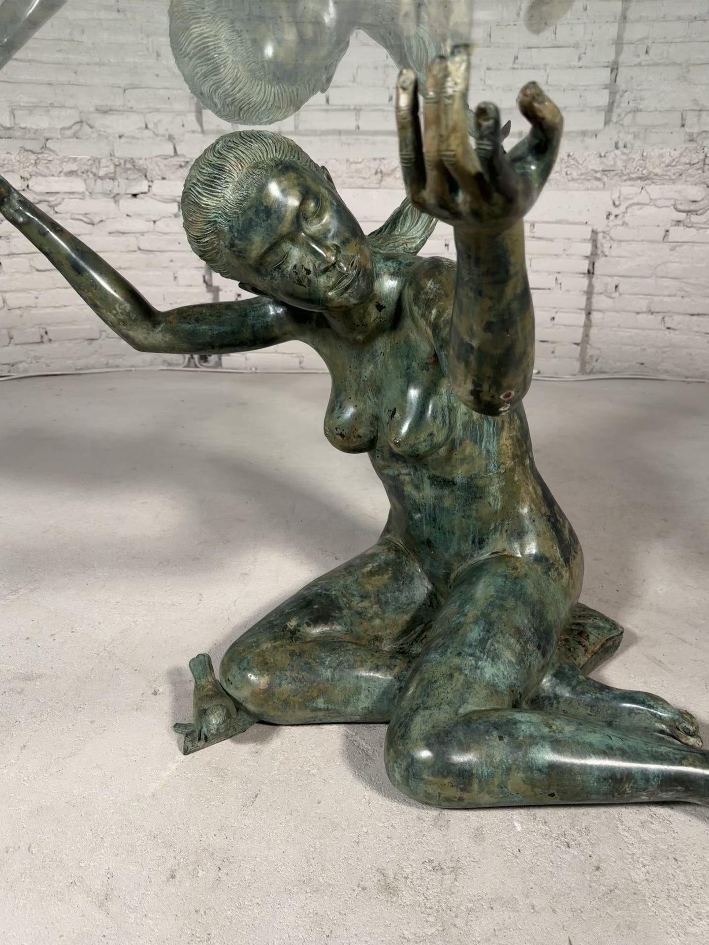 Load video: Bronze Woman Sculpture Glass Dining Table