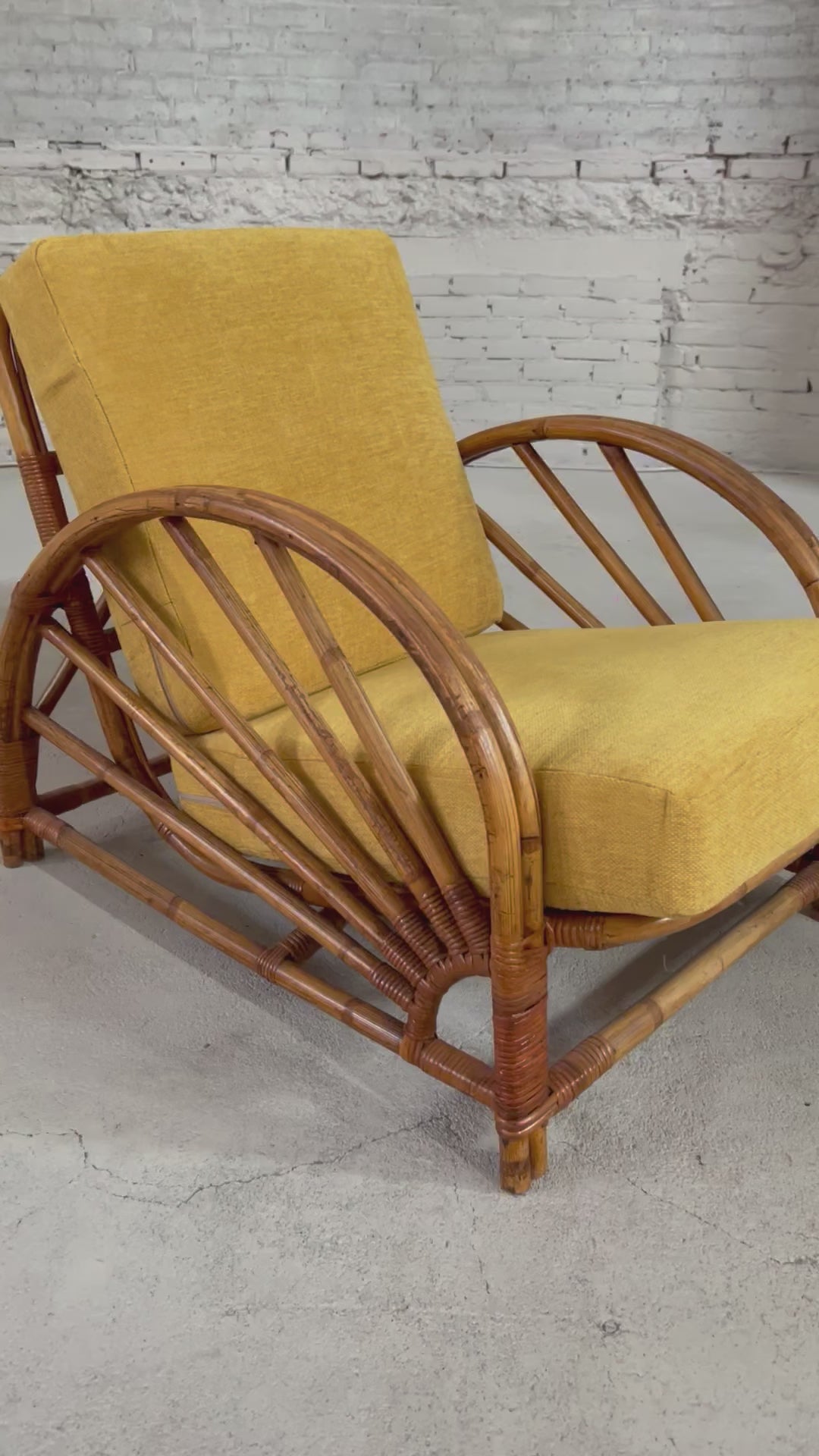 Load video: Paul Frankl rattan chair