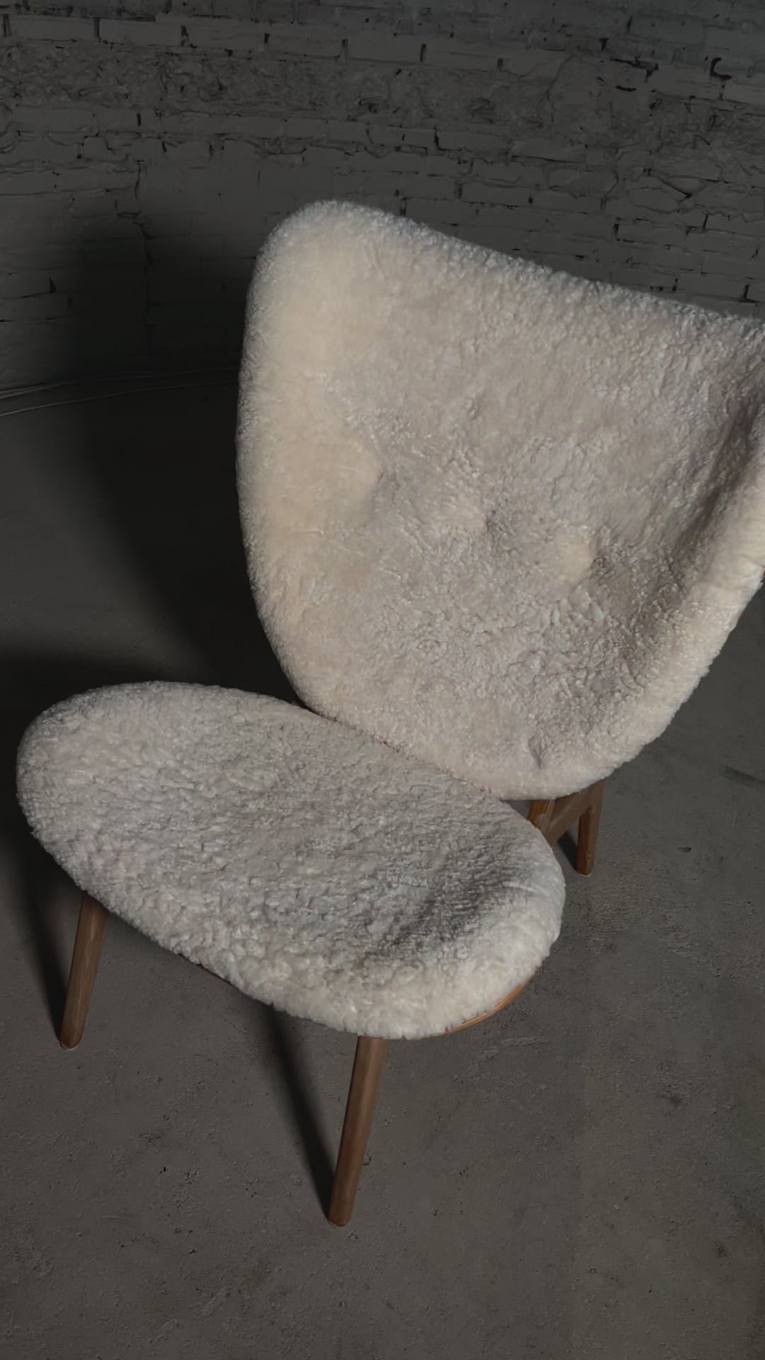 Load video: Elephant Chair Sheepskin